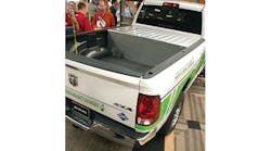This Ram 4x4 pickup addresses the natural gas storage issue by putting a tank within a steel enclosure in the front of the pickup box.