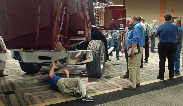 NTEA members get a closeup look at the Western Star lineup following the truck manufacturerrsquos presentation at the Truck Product Conference including a high ground clearance snowplow package for the 4700 model