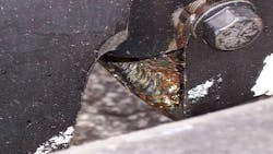 The frame had been welded across on the top side of the lower flange The frame had been welded across on the top side of the lower flange