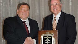 Incoming TTMA chairman Dick Giromini right thanks Andy Tanner for serving as TTMA chairman during the past year Incoming TTMA chairman Dick Giromini right thanks Andy Tanner for serving as TTMA chairman during the past year