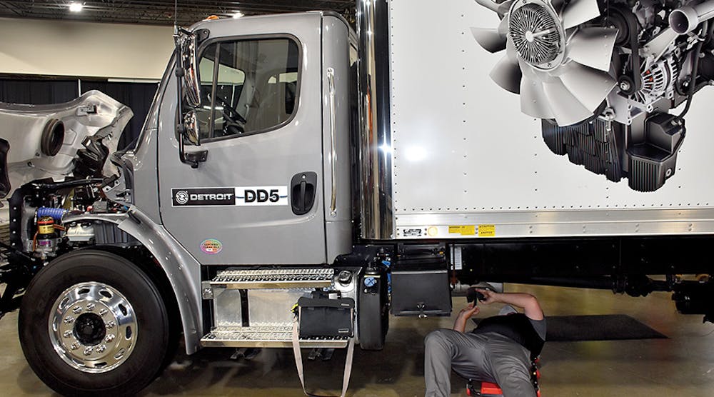 The frame of a Freightliner M2 106 box truck gets a close inspection.