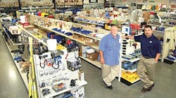 Russell Sanders, left, parts manager of the La Porte location, and Jeff Murillo, director of parts for Utility Trailer Sales Southeast Texas, designed the 10,500-square-foot retail area&mdash;the second largest in the dealership.