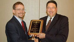 Kentucky Trailerrsquos George Gauntt left presents a plaque to Dan Giles Fontaine Trailer for serving as chairman of the TTMA Engineering Committee Kentucky Trailerrsquos George Gauntt left presents a plaque to Dan Giles Fontaine Trailer for serving as chairman of the TTMA Engineering Committee