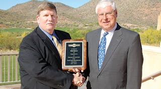 Bill Schaffer, left, thanks Rick Quinn for serving as chairman of the TTMA associate members for 2011-2012.