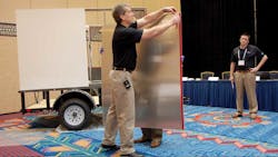 Brent Bystrom demonstrates how quickly a van trailer can be assembled Brent Bystrom demonstrates how quickly a van trailer can be assembled