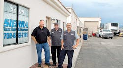 Business is good and space is tight once more at Sierra Truck. Shown are Matt Beatty, general manager; Bill Hottel, parts supervisor; and Ron Kaufenberg, service manager.