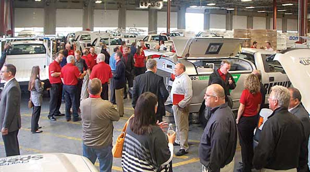 Auto Truck employees and customers gather at the opening of the company&rsquo;s new ship-through facility in Kansas City.