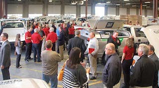 Auto Truck employees and customers gather at the opening of the company&rsquo;s new ship-through facility in Kansas City.
