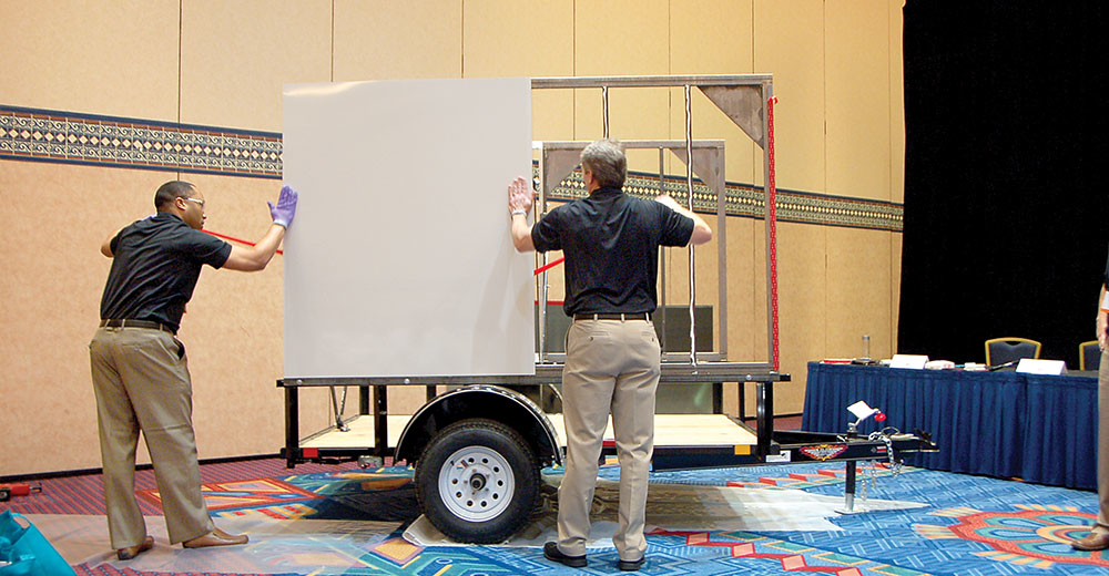 Representatives of 3M demonstrate sidewall asssembly during the Assembly Methods workshp during this yearrsquos NATM convention