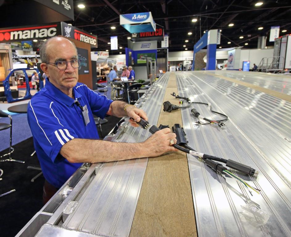 East shows flatbed with new TruckLite harness Trailer Body Builders