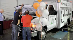 TPC Ford hybrid: Ford brought along an XL Hybrid conversion E-350 with a Rockport body.