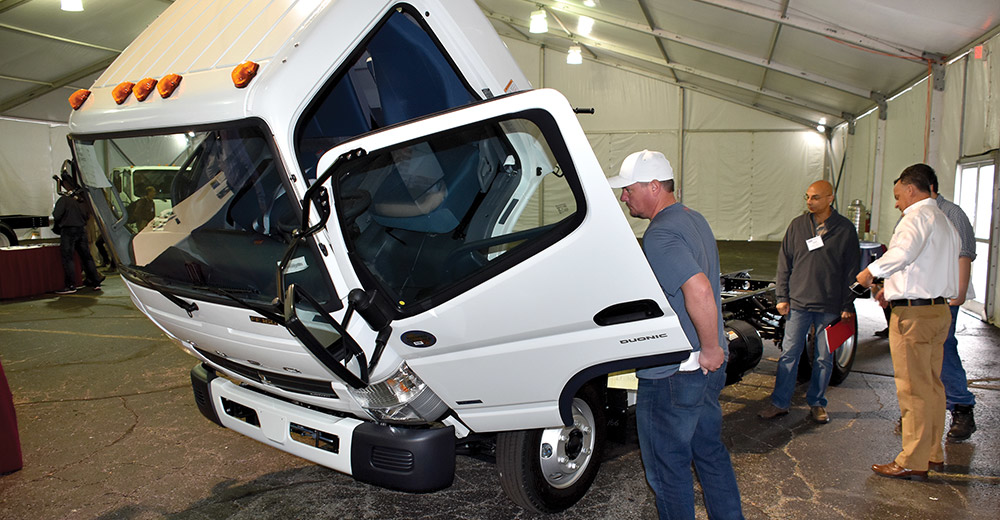 A Fuso FE160 attracts some attention.
