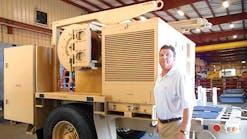 MGS president Andy Gehman with a Trailer-Mounted Shelter Support (TMSS). The system includes shelter, generator, ECU, air compressor, and multiple tools for set-up and tear down. It is usually used by the Marine Corps.