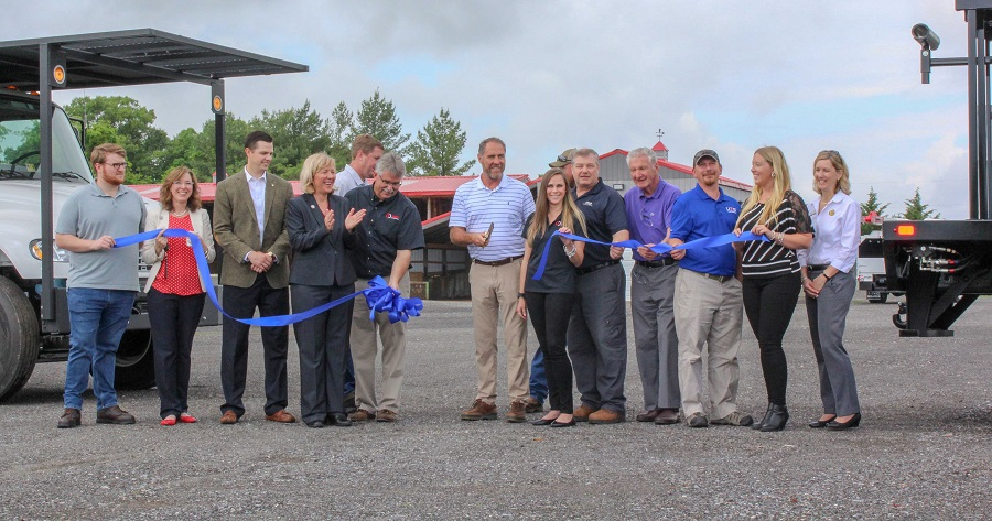 Custom Truck One Source ribbon cutting