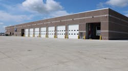 The new 55,000-square-foot facility includes a two-floor office area for trailer sales, a service center with 16 service bays, and a new drive-through wash station.