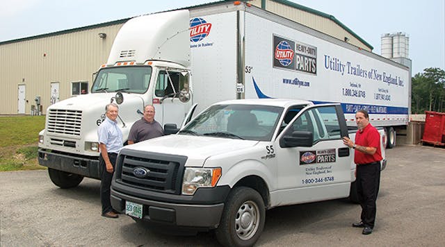 Parts delivery is an important part of the Utility Trailers of New England operation. Shown with some of the delivery vehicles based at the company&rsquo;s North Oxford MA location are Gary Fruscello, vice-president and general manager; Jim Haley, parts director and branch manager, and Norman Vincent, service director.