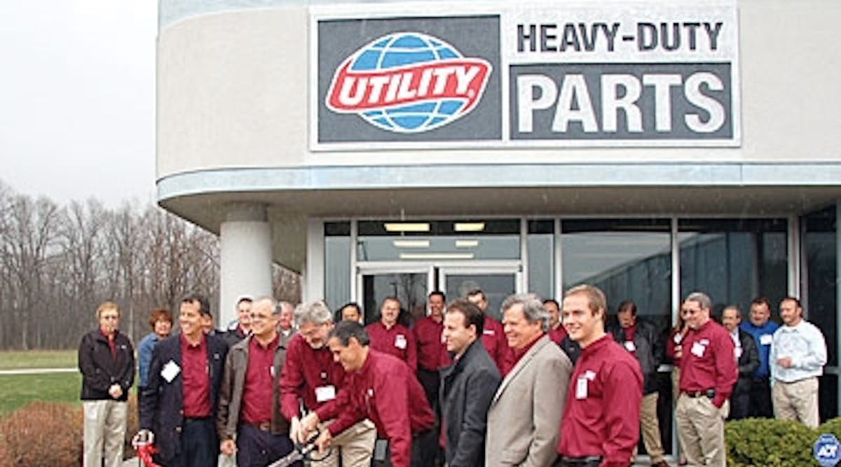 Top management from Utility Trailer Manufacturing celebrates the opening of the company&apos;s new parts distribution center earlier this year. The 243,000-sq-ft facility near Cincinnati takes the place of two Utility parts distribution centers&mdash;one in California and the other in Ohio.