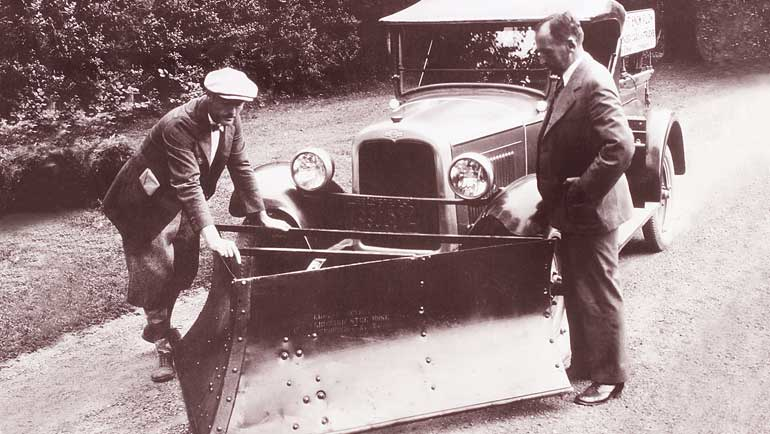 The Meyer Auto Snow Plow Company started in 1926 when Edward B Meyer put a wooden moldboard on the front of a Buick to clear his driveway on a farm in Newburgh New York
