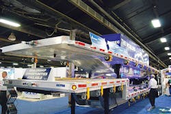 The new Alutrec ldquoCapacityrdquo flatbed is shown loaded aboard an Alutrec dropdeck platform at the MidAmerica Trucking Show in Louisville Note how the smooth underbody transitions from the upper coupler to the deeper midsection The new Alutrec ldquoCapacityrdquo flatbed is shown loaded aboard an Alutrec dropdeck platform at the MidAmerica Trucking Show in Louisville Note how the smooth underbody transitions from the upper coupler to the deeper midsection