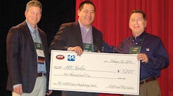 Lucas Landis, marketing director for ATC Trailers, receives the NATM Green Award from Mike Lloyd, NATM president, and Ron Yarnell, PPG. The $5,000 award, sponsored by PPG, goes to the winning company&rsquo;s favorite charity.