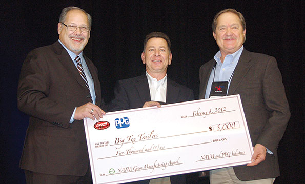 Gary Potter NATM president and Ron Yarnell PPG present Lynn Beal of Big Tex Trailers with a check representing the Big Texrsquos receipt of the NATM Green Manufacturing Award The award sponsored by PPG will go to Big Texrsquos charity of choice