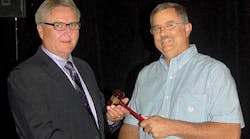 Michael Shuemake, president of Central Valley Trailer Repair, left, receives the gavel of office from Mike Dye, president of Southwest Trailers &amp; Equipment in Oklahoma City.
