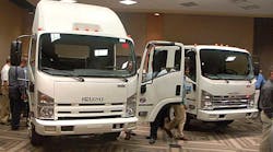 NTEA members check out the Isuzu lineup, which includes the NPR Eco-Max and the new NPR-XD.