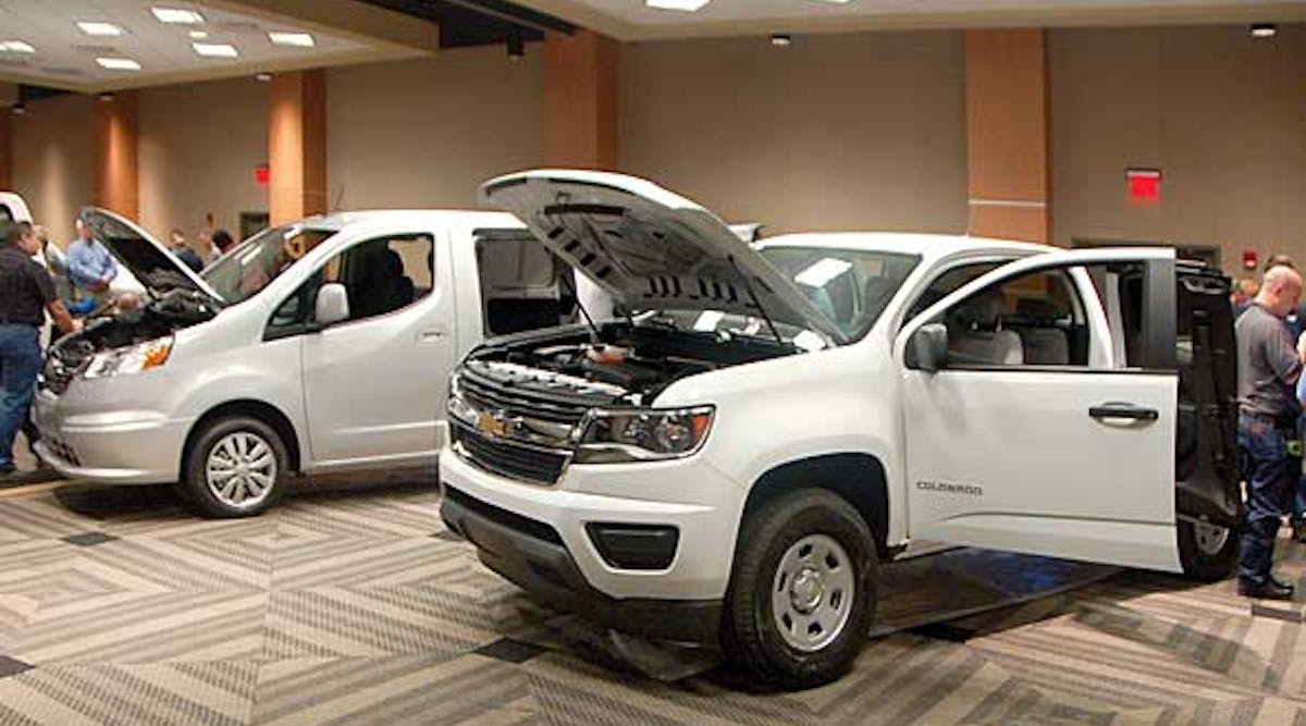 GM rolled out its new mid-sized pickup, along with new compact van.
