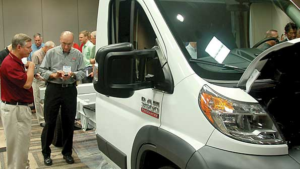 The new Ram ProMaster attracts a crowd during the Ram display of the Truck Product Conference