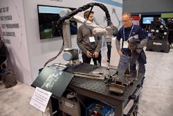 Vectis co-founder Josh Pawley, at left, explains the productivity advantages offered by a cobot welding system. Vectis co-founder Josh Pawley, at left, explains the productivity advantages offered by a cobot welding system.