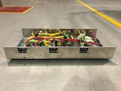 Instead of mounting the trailer dump valves in various places in the subframe area, Hicks has consolidated them into a 'valve cartridge,' a single enclosure that protects the valves, allows for easy pre-installation testing, and simplifies access for maintenance. Instead of mounting the trailer dump valves in various places in the subframe area, Hicks has consolidated them into a 'valve cartridge,' a single enclosure that protects the valves, allows for easy pre-installation testing, and simplifies access for maintenance.