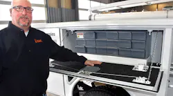 Northland Equipment Owner and President Brian Williams points out the rubber matting added as a custom touch on upfits.