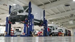 Electric Transit vans being assembled at Lightning&rsquo;s production facility in Loveland, Colo.