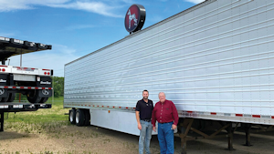 Crossroads Trailer President Mark Habben, left, stands with his father, company co-founder and CEO Darv Habben.