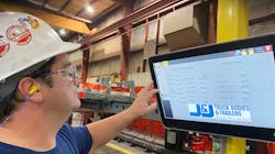 J&J Robotics Manager Brian Kreger enters the settings to instruct robots on the correct welds for the unit currently at the understructure station. J&J Robotics Manager Brian Kreger enters the settings to instruct robots on the correct welds for the unit currently at the understructure station.