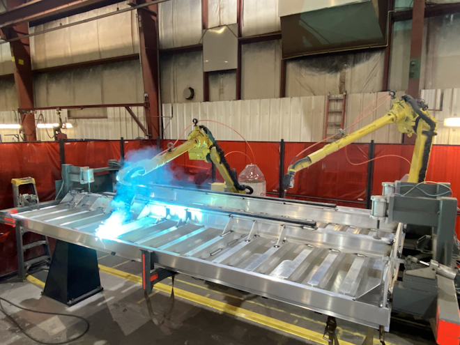 One of the two automated welding stations now in operation at J&J Truck Bodies & Trailers does preliminary work on an aluminum understructure.