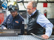 Anthony Bell, team lead, fabrication, (left) and Joshua J. Coster, Wil-Ro Inc. president and owner discuss a welding approach.