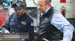 Anthony Bell, team lead, fabrication, (left) and Joshua J. Coster, Wil-Ro Inc. president and owner discuss a welding approach.