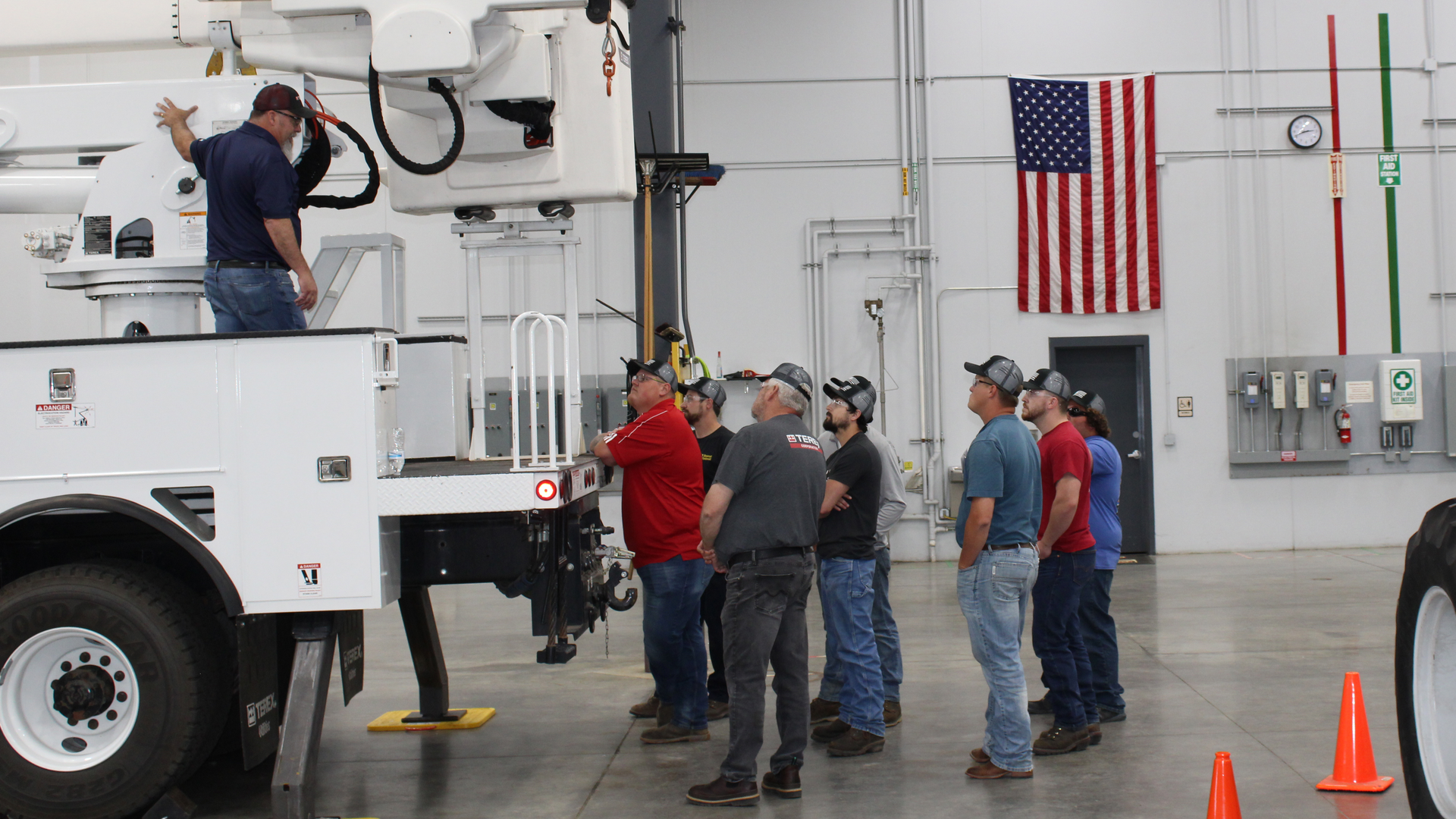Technicians listen during a demonstration at Terex Utilities' service training.
