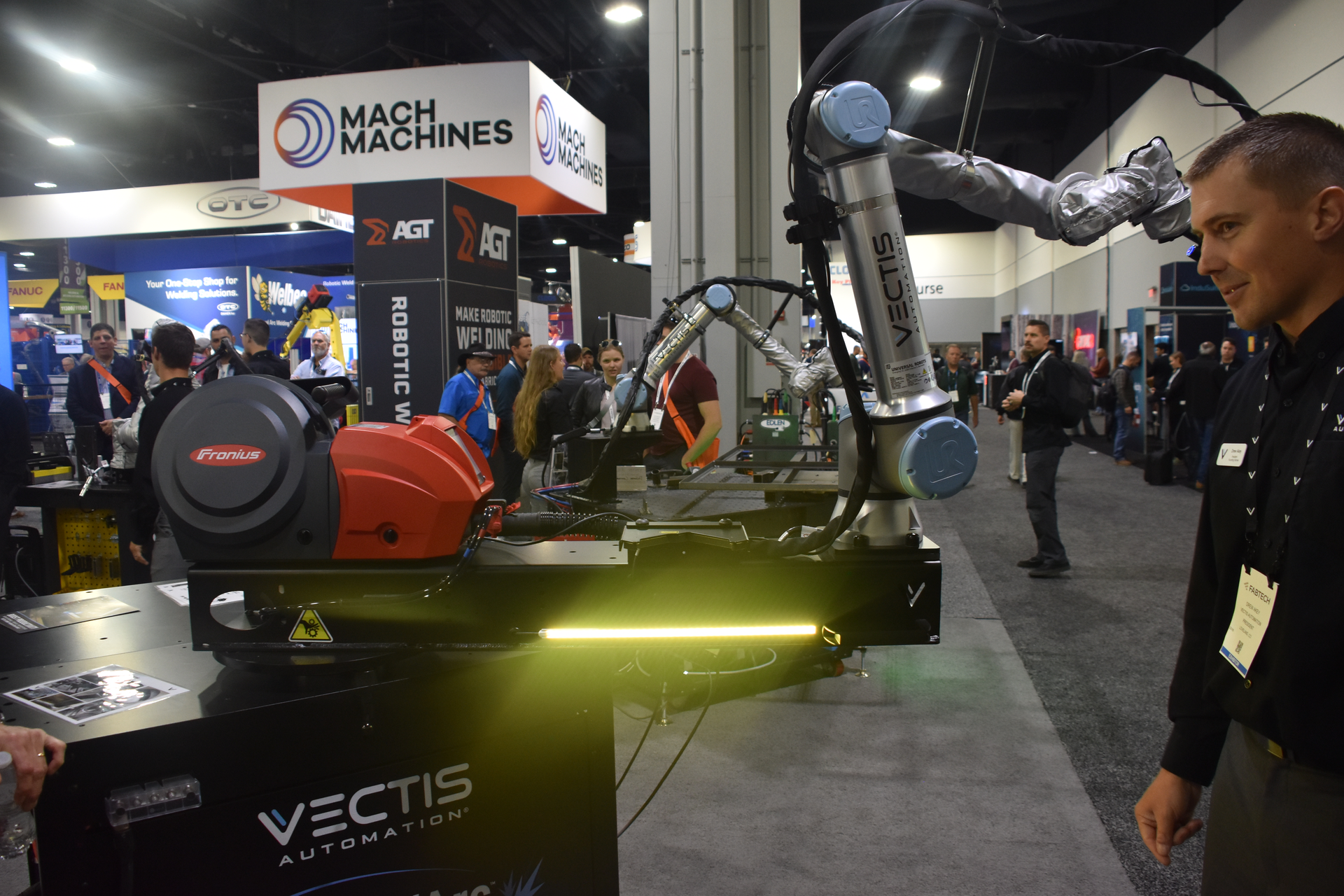 Drew Akey, president and founding partner, Vectis Automation, demonstrates the Park&rsquo;N&rsquo;Arc&mdash;a rotational range extender that allows for the base of the cobot to be manually moved to various locations.