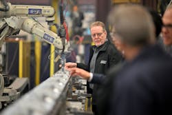Gary Brown, senior VP of Operations, East, demonstrates the new Robot Arc Welder. Gary Brown, senior VP of Operations, East, demonstrates the new Robot Arc Welder.