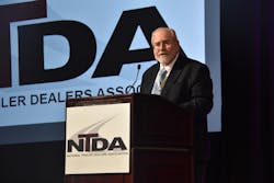 Outgoing NTDA Chairman Richard Bloomquist delivers the opening remarks at the convention. Outgoing NTDA Chairman Richard Bloomquist delivers the opening remarks at the convention.