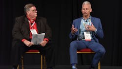 Moderator Bill Schaffer, at left, questions Hydro Extrusion's Jerrod Hoeft about the challenges facing the aluminum supplier. Moderator Bill Schaffer, at left, questions Hydro Extrusion's Jerrod Hoeft about the challenges facing the aluminum supplier.