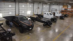 These early Zeus Z-19 Class 5 cab chassis demonstration units illustrate the various stages of assembly at the Zeus Electric Chassis Inc. shop.
