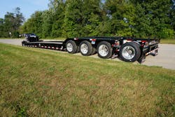 The trailer’s 26-ft.-long, 8-ft. and 6-in.-wide main deck is constructed with a fully welded I-beam design, using 100K flanges and 80K webs, as well as upper-flange reinforcement. The trailer’s 26-ft.-long, 8-ft. and 6-in.-wide main deck is constructed with a fully welded I-beam design, using 100K flanges and 80K webs, as well as upper-flange reinforcement.