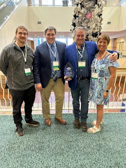 The Messenbrink family proudly displays LANE Trailer's 2023 NATM Innovation Award. The Messenbrink family proudly displays LANE Trailer's 2023 NATM Innovation Award.