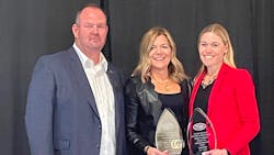 Brenda Jennissen, center, and Bonnie Radjenovich, Felling Trailers co-owners, received the Pam O&apos;Toole Trusdale Woman in Mfg. Award.