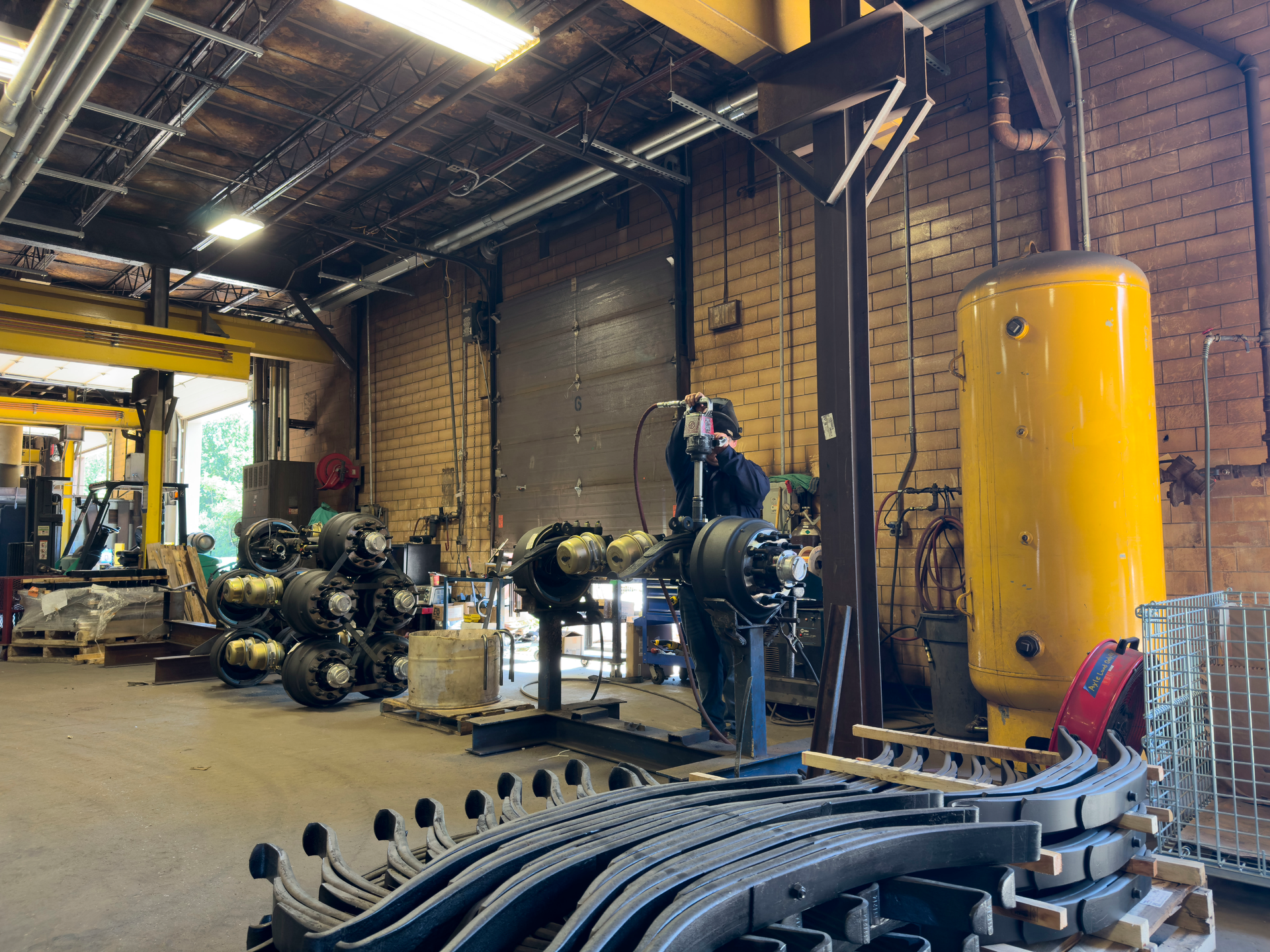 EMCO 22.5K axle leaf springs at Pratt&rsquo;s facility, ready for installation.