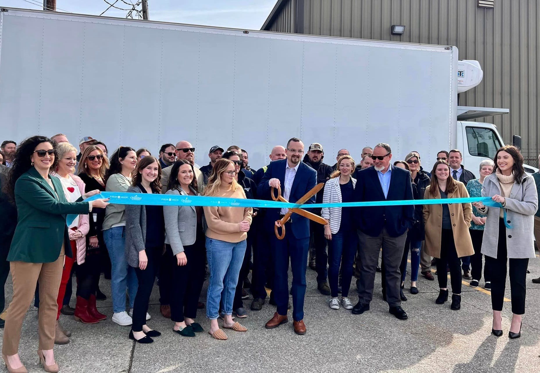 65c0250b5d2d66001e04e11e Hmc Ribbon Cutting 1