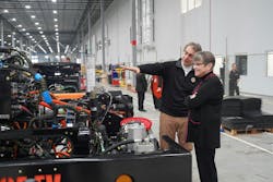 Orange EV co-founder Kurt Neutgens shows Kansas Gov. Laura Kelly an Orange EV chassis on the production line. Orange EV co-founder Kurt Neutgens shows Kansas Gov. Laura Kelly an Orange EV chassis on the production line.